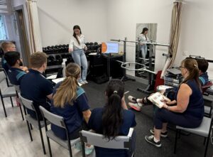 Amy DUnphy talking to Kilkenny Physiotherapy staff